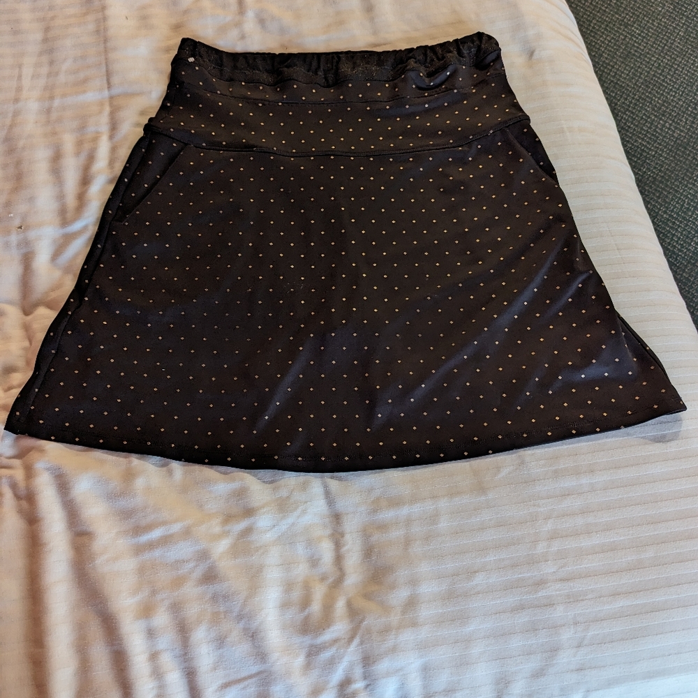 Tail Tech Golf Skort shorts. Black with Gold diamond design. Since large.
